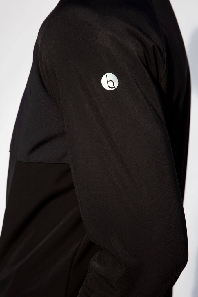 Close up of the arm on the belu life mens fleece sweater in black