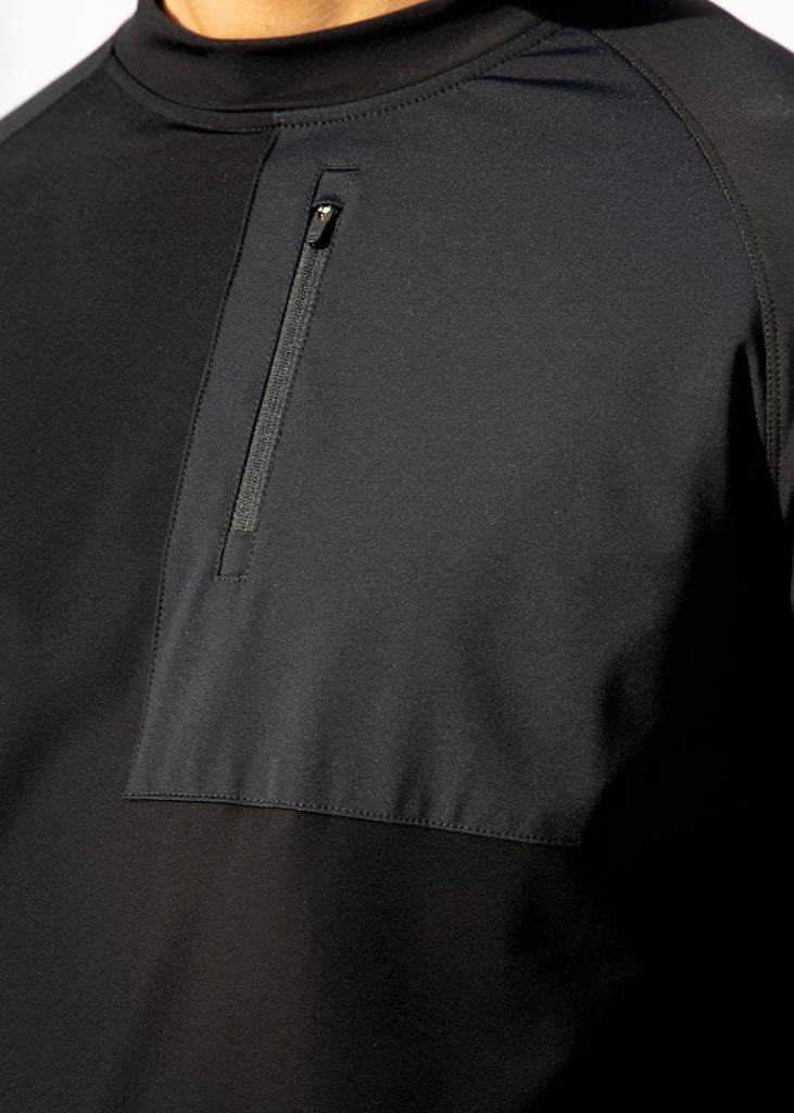 Close up of the material of the Belu Life Bergen Fleece a Mens fleece pullover in black 