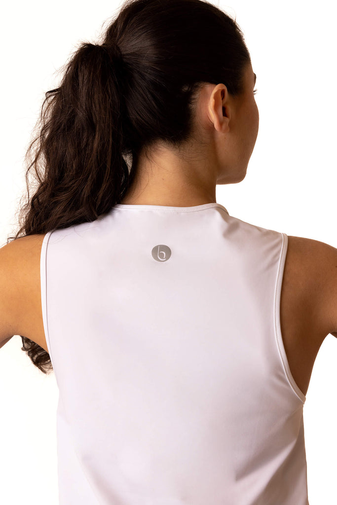 view of the back of our Sahara vest in white - a women's gym vest from a sustainable activewear brand 